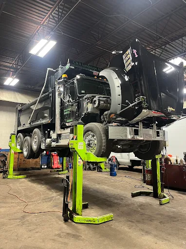 Commercial truck at R J Hallisey Truck Repair facility in Wakefield MA